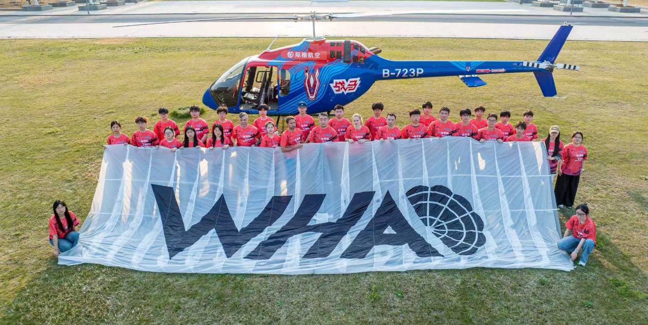 WHA Parachute Demonstration Team with team flag