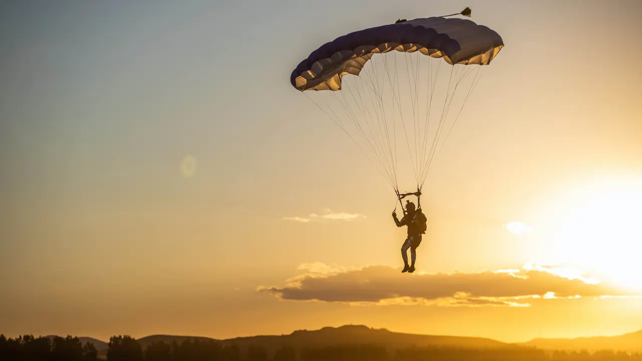 WHA Aviator intermediate main canopy flying at sunset